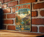 A vintage-style metal sign for Cimarron Canyon State Park in New Mexico, featuring a scenic landscape with mountains and a river.