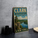 A vintage-style sign for Clark Reservation State Park in New York, featuring a scenic landscape with a lake and mountains.