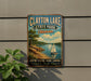 A vintage-style metal sign for Clayton Lake State Park in Oklahoma, featuring a sailboat on a lake and text promoting various outdoor activities such as boating, fishing, hiking, and camping.