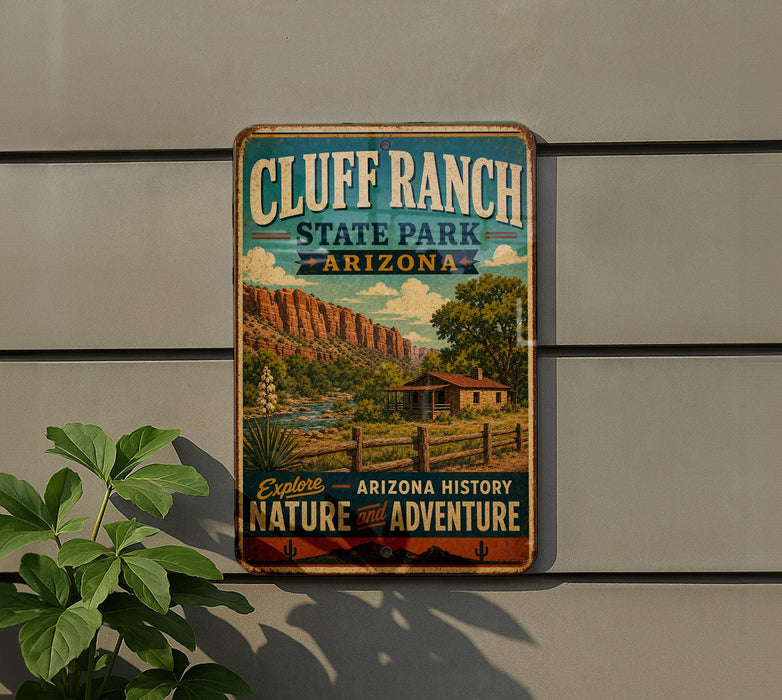 A vintage-style metal sign for Cluff Ranch State Park in Arizona, featuring a scenic illustration of the park's landscape and a cabin.
