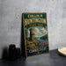 A vintage metal sign for Ellis P. Huntington State Park in Connecticut, featuring a castle and a scenic landscape.