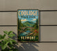 A vintage metal sign for Coolidge State Park in Vermont, featuring a scenic landscape with a bridge and mountains.