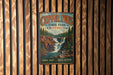 A vintage-style metal sign for Copper Falls State Park in Wisconsin, featuring a scenic image of the waterfall surrounded by pine trees.