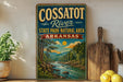 A vintage-style sign for the Cossat River State Park-Natural Area in Arkansas, featuring a scenic landscape with a river, mountains, and trees.