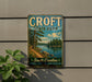 A vintage metal sign for Croft State Park, featuring a scenic landscape with a lake, trees, and a path leading to the park.
