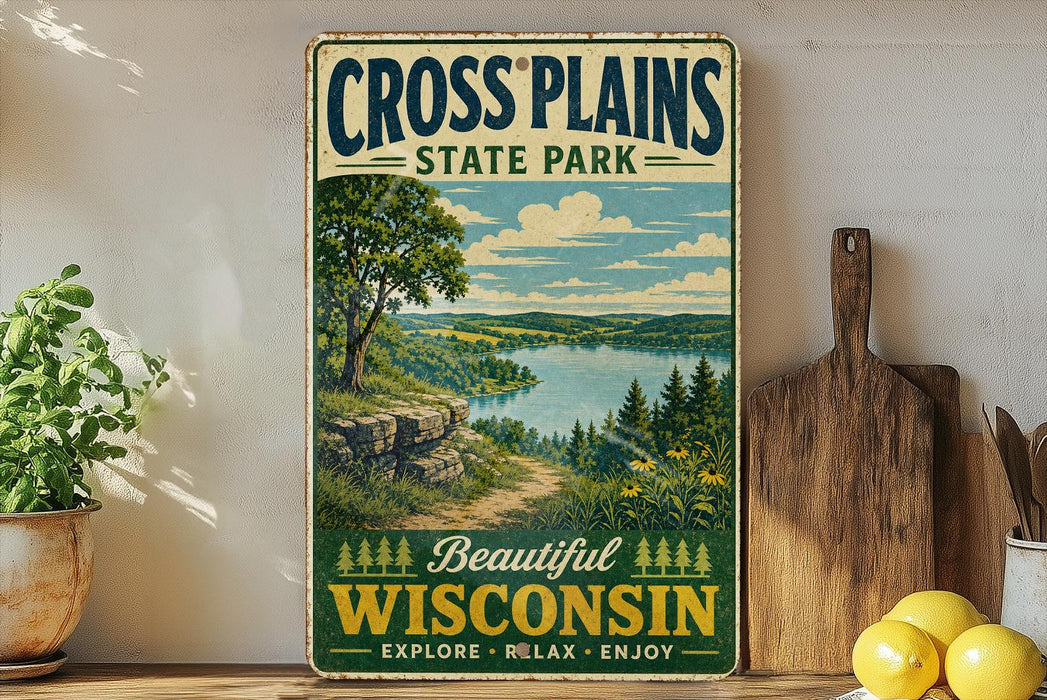 A vintage-style sign for Cross Plains State Park in Wisconsin, featuring a scenic landscape with a lake and mountains.