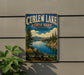 A vintage metal sign for Curlew Lake State Park in Washington, featuring a scenic landscape with a lake, mountains, and pine trees.