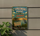 A vintage-style sign for Cypremort Point State Park in Louisiana, featuring a bird and a coastal landscape.