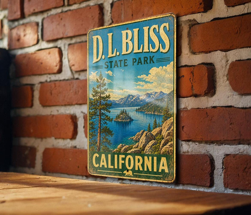 A vintage metal sign for D.L. Bliss State Park in California, featuring a scenic landscape with mountains, a lake, and a pine tree.