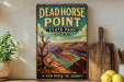 A vintage-style metal sign for Dead Horse Point State Park in Utah, featuring a scenic illustration of the Grand Canyon.