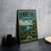A vintage-style sign for Dennis Hill State Park in Connecticut, featuring a scenic landscape with a lake and mountains.
