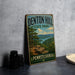 A vintage-style metal sign for Denton Hill State Park in Pennsylvania, featuring a scenic landscape with a river and forest.