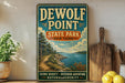 A vintage-style poster for "DEWOLF POINT STATE PARK NEW YORK" is displayed on a wall, with a wooden cutting board and some potted plants in the foreground.