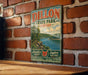 A vintage-style metal sign for Dillon State Park, Ohio, featuring a scenic landscape with a river and forest.