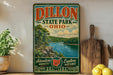 A vintage-style sign for Dillon State Park, Ohio, featuring a scenic landscape with a river and forest.