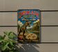 A vintage-style metal sign for Dinosaur Valley State Park, featuring a large illustration of a T-Rex dinosaur and a scenic landscape.