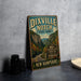 A vintage-style metal sign for Dixville Notch State Park in New Hampshire, featuring a scenic mountain landscape.