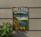 A vintage-style sign for the Dolliver Memorial State Park in Iowa, featuring a scenic landscape with a river and mountains.