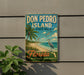 A vintage-style sign for Don Pedro Island, Florida, featuring palm trees, a beach, and a bird, mounted on a wall.