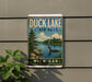 A vintage-style metal sign for Duck Lake State Park in Michigan, featuring a scenic image of a lake with a duck swimming in the foreground.