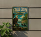 A vintage-style metal sign for Eagle Creek State Park in Illinois, featuring an eagle perched on a tree branch and a river with people in a boat.