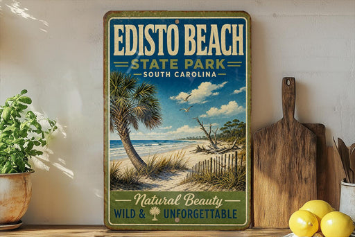 A vintage-style sign for Edisto Beach State Park in South Carolina, featuring a beach scene with palm trees and a clear blue sky.