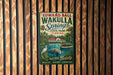 A vintage-style metal sign for Edward Ball Wakulla Springs State Park in Florida, featuring illustrations of a manatee, palm trees, and a boat on the water.