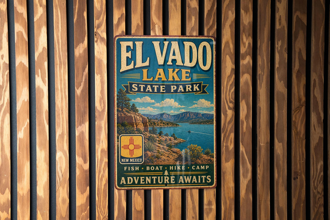 A vintage metal sign for El Vado Lake State Park, featuring a scenic landscape with mountains, water, and a boat, mounted on a wooden wall.