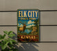 A vintage-style sign for Elk City State Park in Kansas, featuring an illustration of a deer in a grassy field with a river in the background.