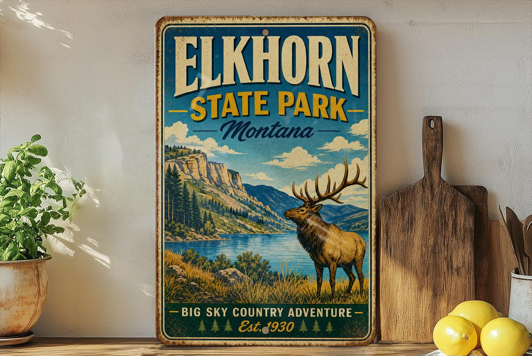 A vintage-style sign for Elkhorn State Park in Montana, featuring a scenic landscape with a deer in the foreground.
