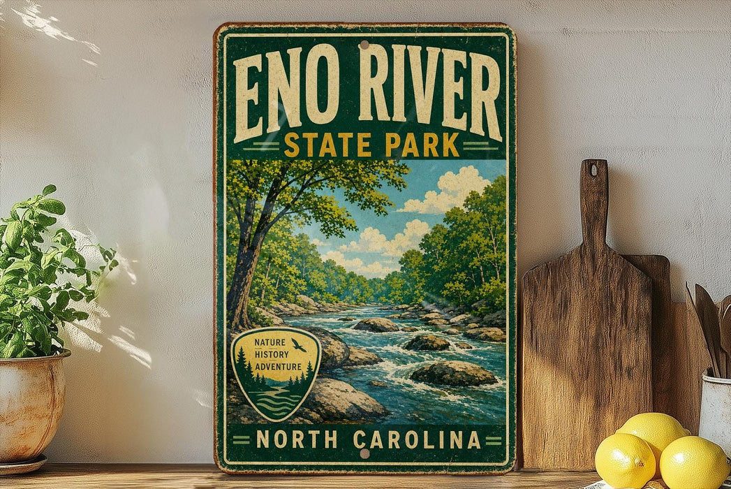 A vintage-style sign for Eno River State Park, featuring a scenic image of a river surrounded by lush greenery, with the text "Eno River State Park" prominently displayed.