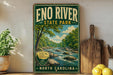 A vintage-style sign for Eno River State Park, featuring a scenic image of a river surrounded by lush greenery, with the text "Eno River State Park" prominently displayed.