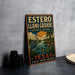 A vintage-style metal sign for Estero Llano Grande State Park in Texas, featuring an illustration of a heron and a sunset landscape.