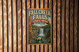 A vintage-style metal sign for Fall Creek Falls State Park in Tennessee, featuring a waterfall and autumn foliage.