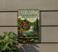 A vintage-style metal sign for Fields Spring State Park in Washington, featuring a scenic image of a waterfall and a red building.