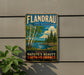 A vintage metal sign for Flandrau State Park in Minnesota, featuring a scenic landscape with birch trees, a lake, and mountains.