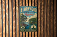 A vintage-style metal sign for Florewood State Park in Mississippi, featuring a scenic illustration of a lake, trees, and a cabin.
