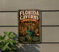 A vintage-style metal sign for Florida Caves State Park, featuring an illustration of the cave system and the text "FLORIDA CAVENS STATE PARK EXPLORE UNDERGROUND BEAUTY"
