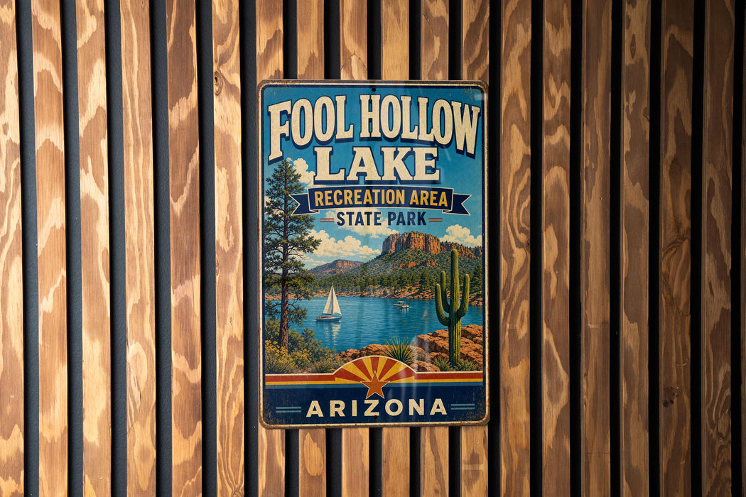 A vintage-style sign for Foolhole Lake, a recreation area in Arizona State Park, featuring a scenic landscape with a lake, mountains, and a sailboat.