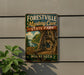 A vintage-style metal sign for the Forestville Mystery Cave State Park in Minnesota, featuring a scenic illustration of the cave and surrounding landscape.