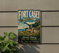A vintage-style sign for Fort Casey State Park in Washington, featuring a cannon and a scenic landscape.