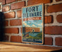 A vintage metal sign for Fort Delaware State Park in Delaware, featuring an illustration of the fort and its surroundings.