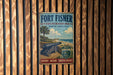 A vintage-style metal sign for Fort Fisher State Recreation Area in North Carolina, featuring a cannon and a beach scene.
