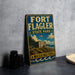 A vintage-style metal sign for Fort Flagler State Park in Washington, featuring an illustration of the fort and surrounding landscape.