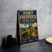 A vintage-style metal sign for Fort Frederick State Park, Maryland, featuring an illustration of a castle and a cannon, along with the text "History, Nature, Adventure, Explore, Discover, Enjoy".