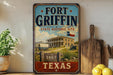 a vintage-style sign for the Fort Griffin State Historic Site in Texas, with a picture of a historic building and a wagon train.