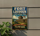 A vintage-style sign for Fort Loudoun State Historic Park in Tennessee, featuring a wooden fort and a Union Jack flag, mounted on a gray wall.