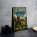 A vintage metal sign for Fort Massac State Park in Illinois, featuring an illustration of a cannon and a wooden fort, with the text "Fort Massac State Park Illinois" and "Historic Frontier Adventure Awaits".