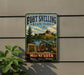 A vintage-style metal sign for Fort Snelling State Park in Minnesota, featuring a cannon, a castle, and a river.