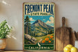 a vintage-style sign for Fremont Peak State Park in California, with a mountain landscape and flowers in the foreground.